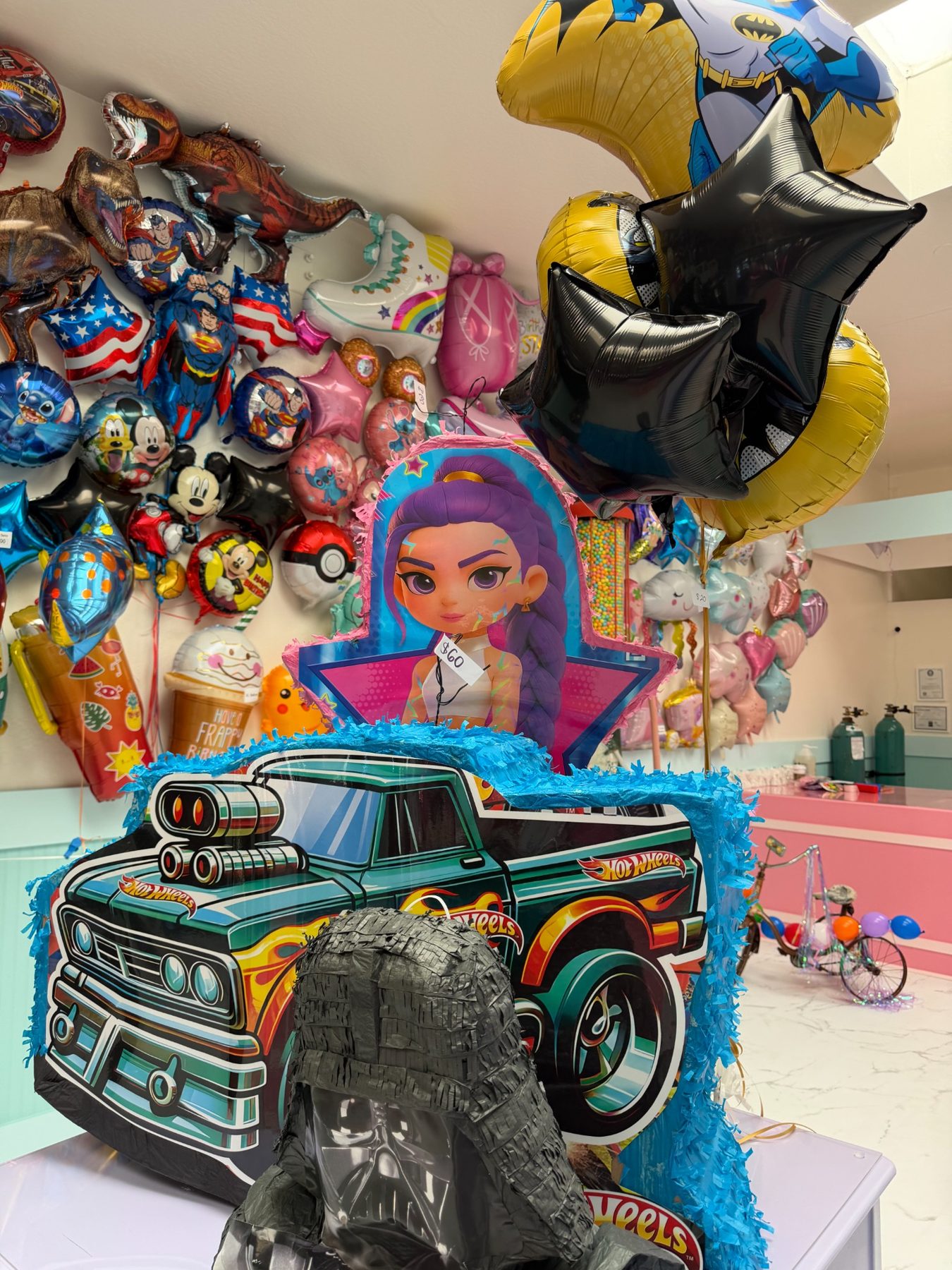 Party piñatas and balloons
